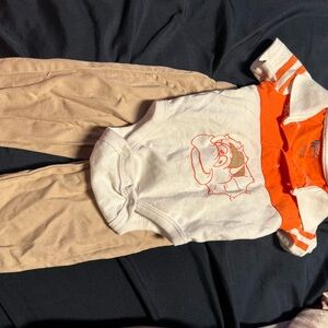 Orange and White Baby Onesie with Tan Pants